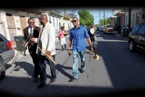 andrews.walk.border Glen David, James, and Troy "Trombone Shorty" Andrews