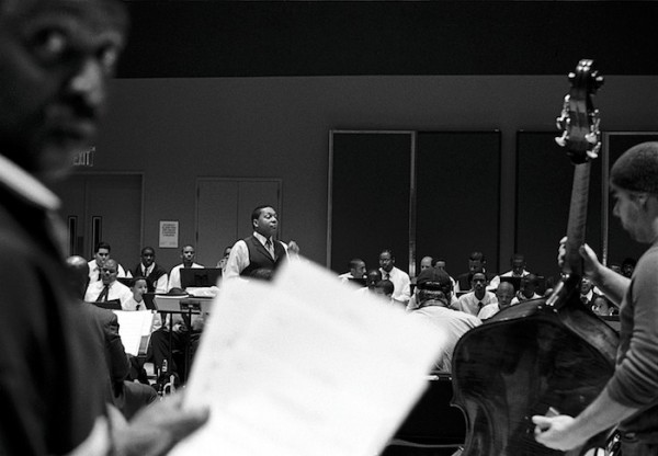 Ingrid Hertfelder photograph of Wynton Marsalis and the Lincoln Center Jazz Orchestra in rehearsal.