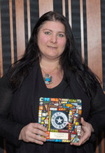 Marci Schramm accepts for French Quarter Festival. (Photo: Kyle Encar)