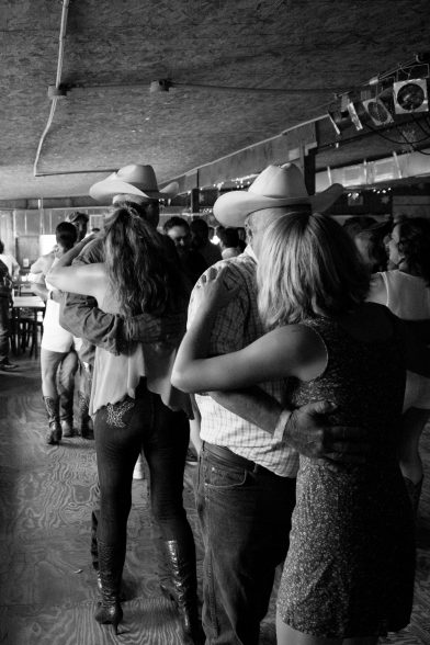 Dancers on the Whiskey River dancefloor. Photo by Noé Cugny.
